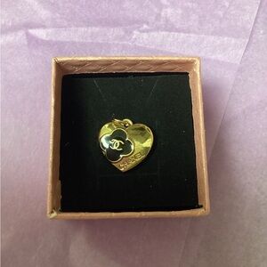 CHANEL Gold and Black Heart pendant.